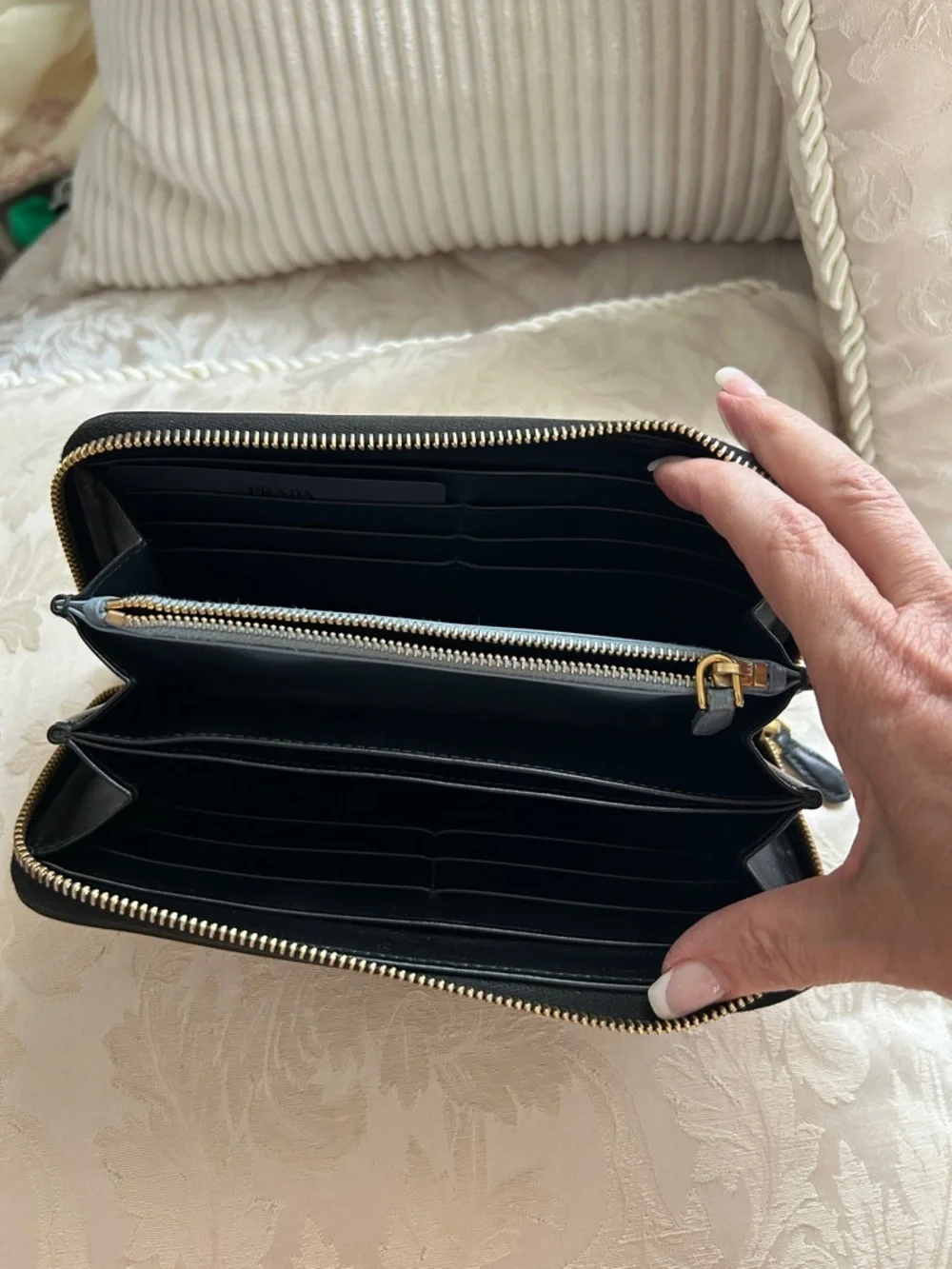 7013. Authentic Prada Black Leather Zip Wallet w/Turquoise Logo Detail & COA.